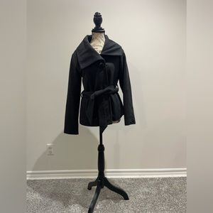 Waist length belter coat with large collar and top button. Perfect condition.